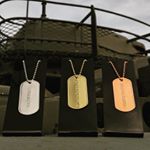 Gold, Silver, and Bronze award Dogtags on Display Stands (Instagram)