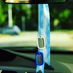 Team dogtags hung on rearview mirror (Instagram)