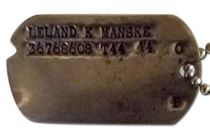 Photo of Corporal Leland Kendall Manske’s Original Military issued 1943 US Army Air Corps Dog Tag Photo of Corporal Leland Kendall Manske’s Original Military issued 1943 US Army Air Corps Dog Tag