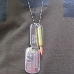 .223 Bullet Pendant with shiny dogtags on chain