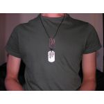 Rusty Steel Dog Tag debossed with black leather cord on tshirt