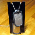 US Army Dog Tags on display stand