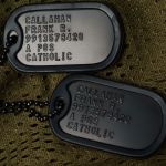 US Special Forces Black Dog Tags on Green Material