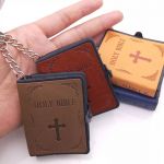 Mini Bible Keychain relative to hand