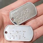 Braille Dog Tag with names Adam and Arron
