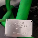 Driver Information Braille Nameplate on Race Car