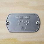 'MEN' Braille washroom sign