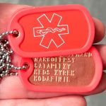 Star of Life Tag Sticker on copper medical dogtags with red silencers