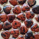 Reddish Stone Heart Pendant showing random pattern distribution