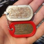 Rusty Steel Dog Tag with diver information